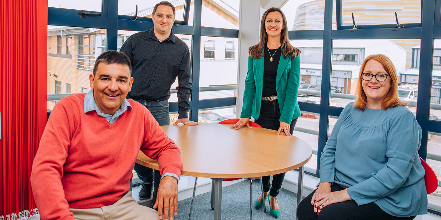 Yvonne is pictured with her new office buddies who use the Essential Co Working Space